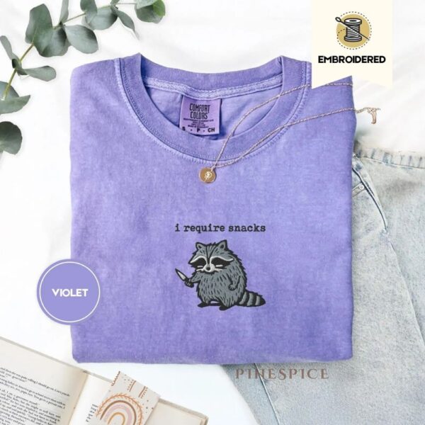 i require snacks embroidered raccoon tee